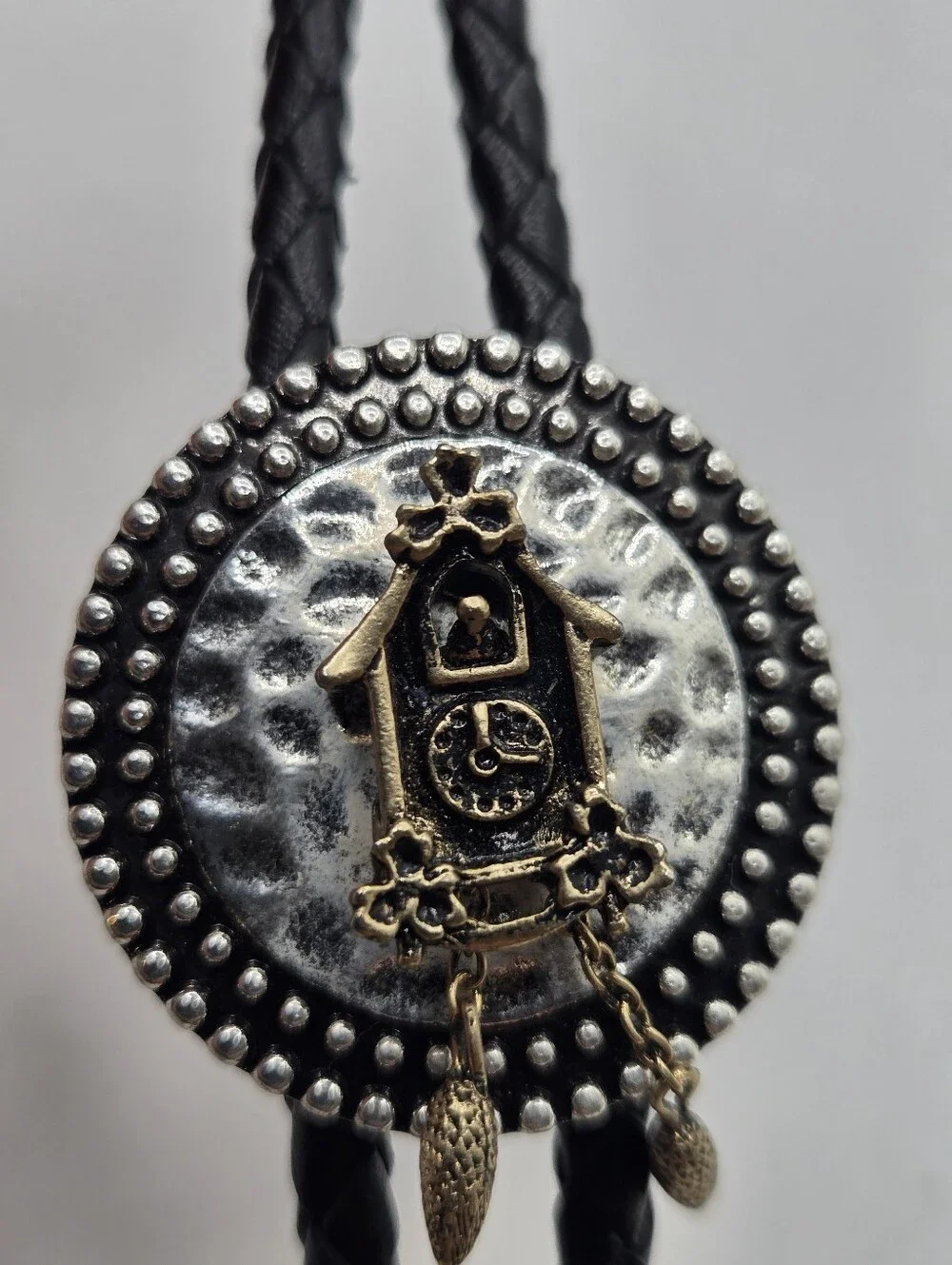 Silver Western Bolo Tie Avon Cuckoo Clock Medallion Leather Braid 70s Eclectic